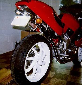 motorcycle with exhaust under seat